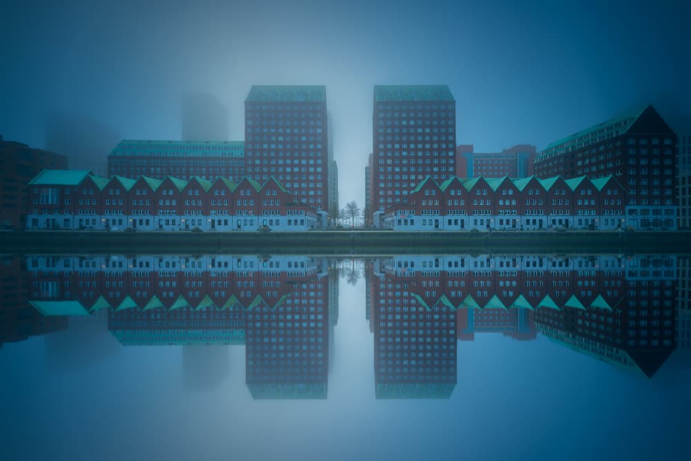 Misty City Reflection by Miguel Pascual — canvas wall art