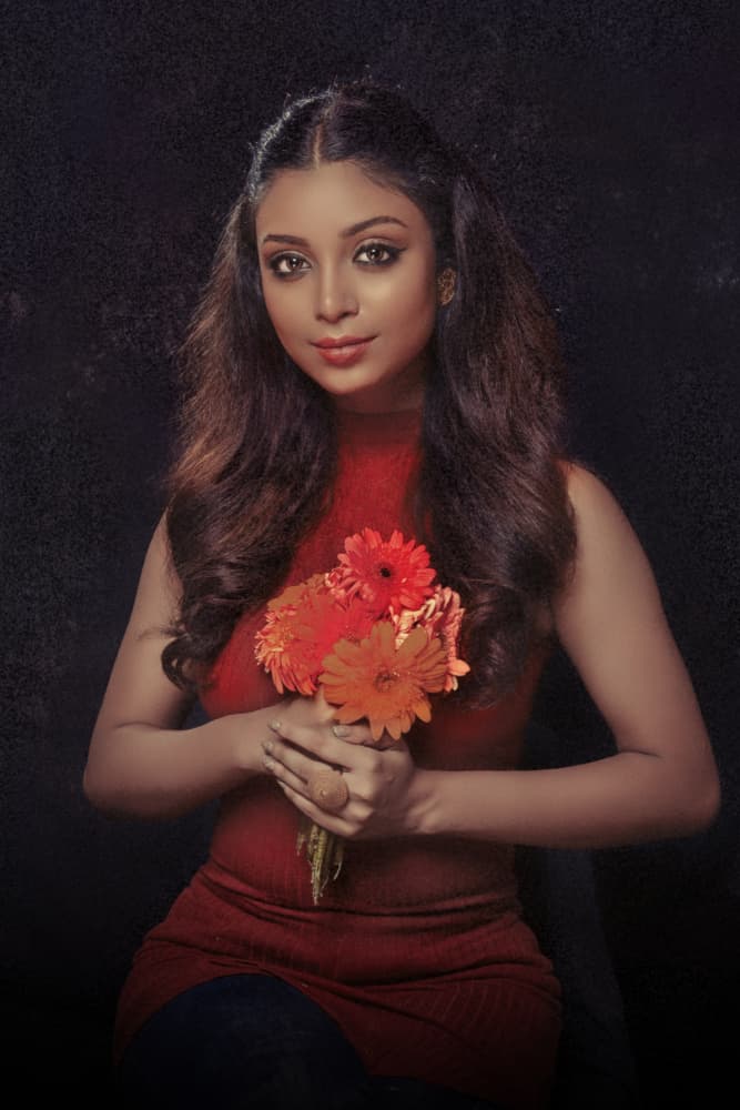 Elegant Woman with Flowers by PARTHA BHATTACHARYYA — canvas wall art