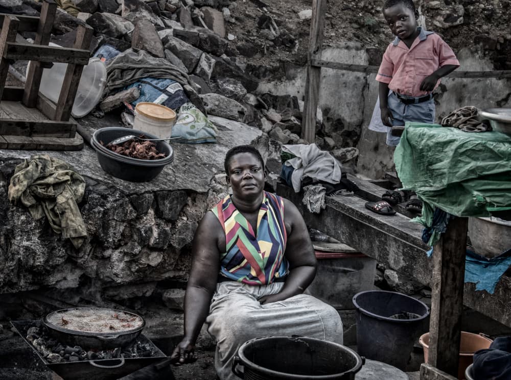 Woman Cooking Outdoors by Joxe Inazio Kuesta Garmendia — canvas wall art
