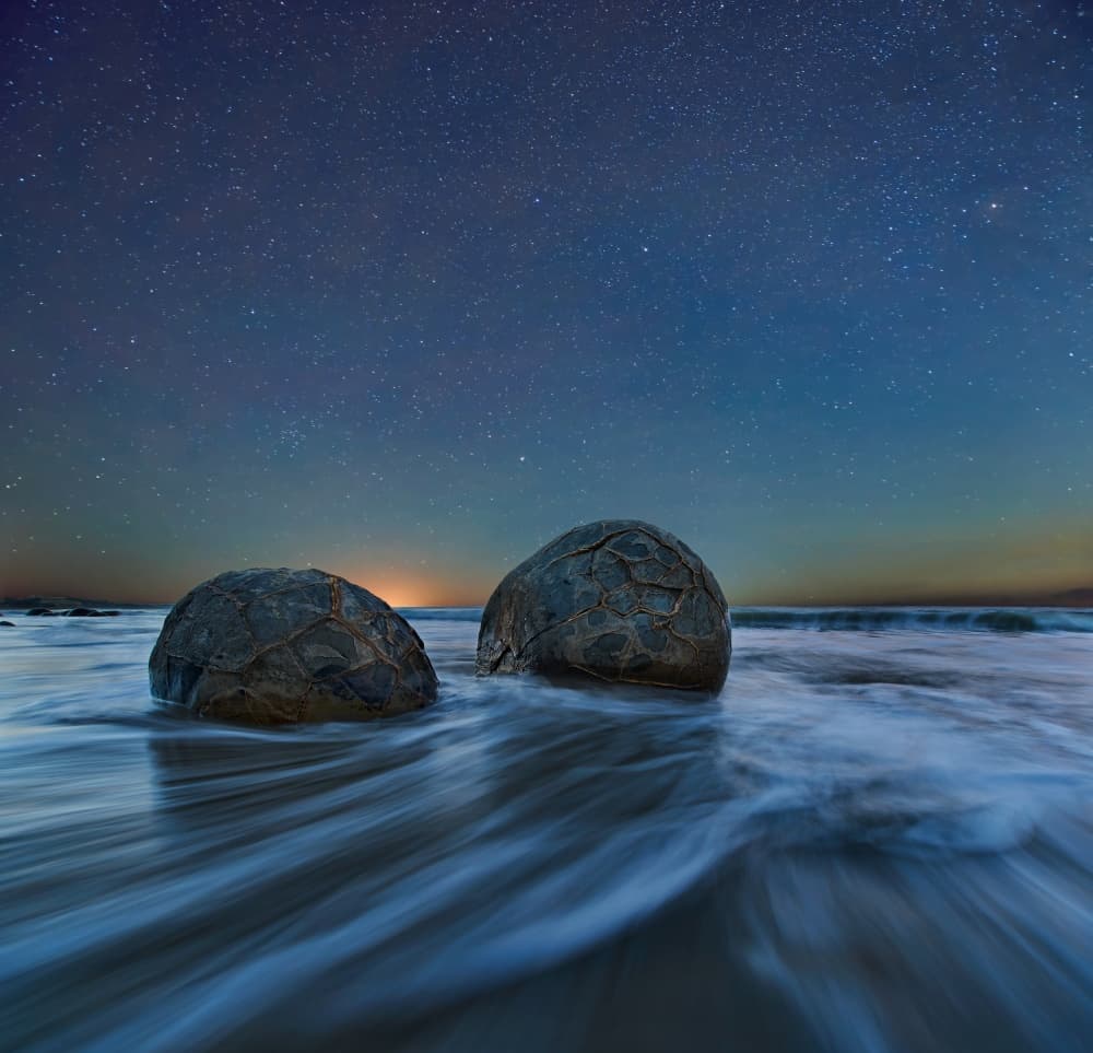 Ocean Boulders Under Stars by Yan Zhang — canvas wall art