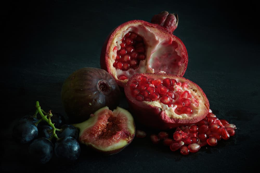 Dark Pomegranate Still Life by Emanuel Papamanolis — canvas wall art