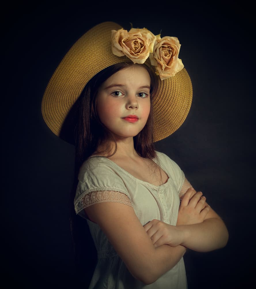 Pensive Girl Rose Hat by Svetlana Melik-Nubarova — canvas wall art
