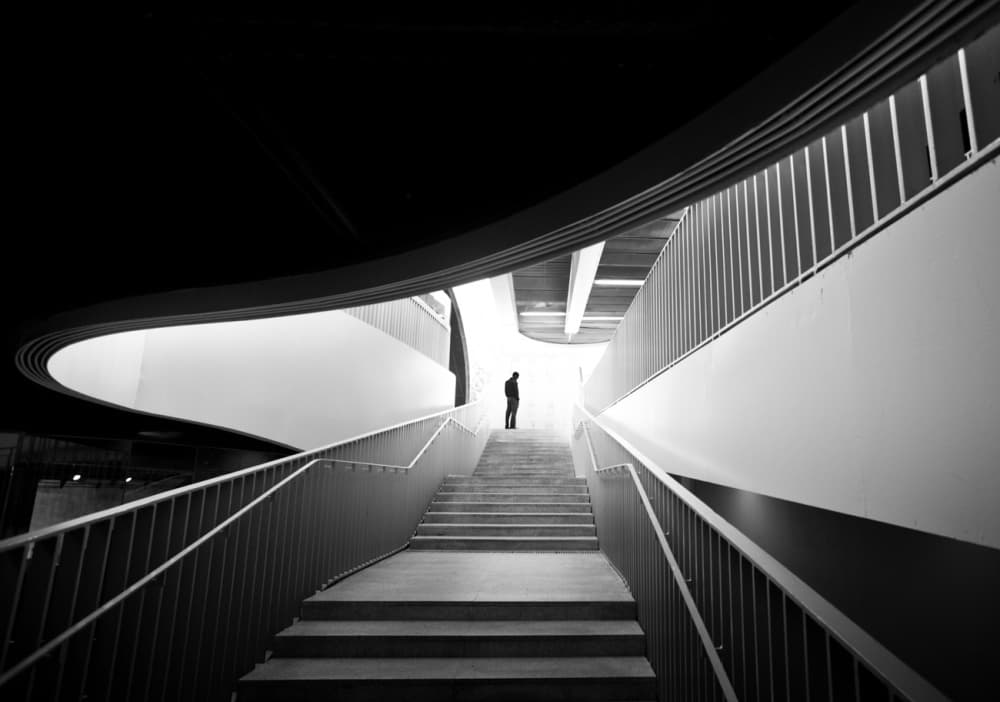 Geometric Ascent Lone Figure by Jesus Gonzalez Vera — canvas wall art