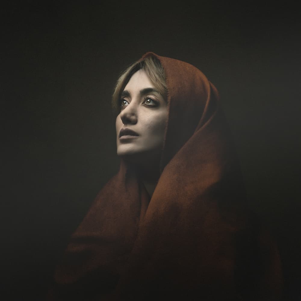 Pensive Hooded Woman by Moein Hasheminasab — canvas wall art