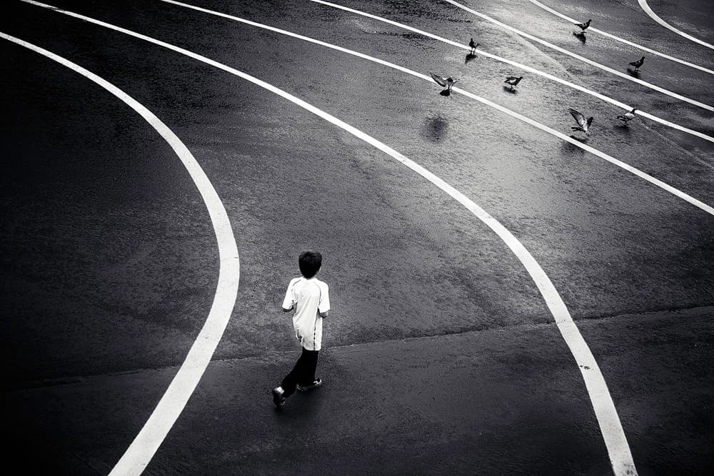 Child on a Curved Track by Dani BS. — canvas wall art