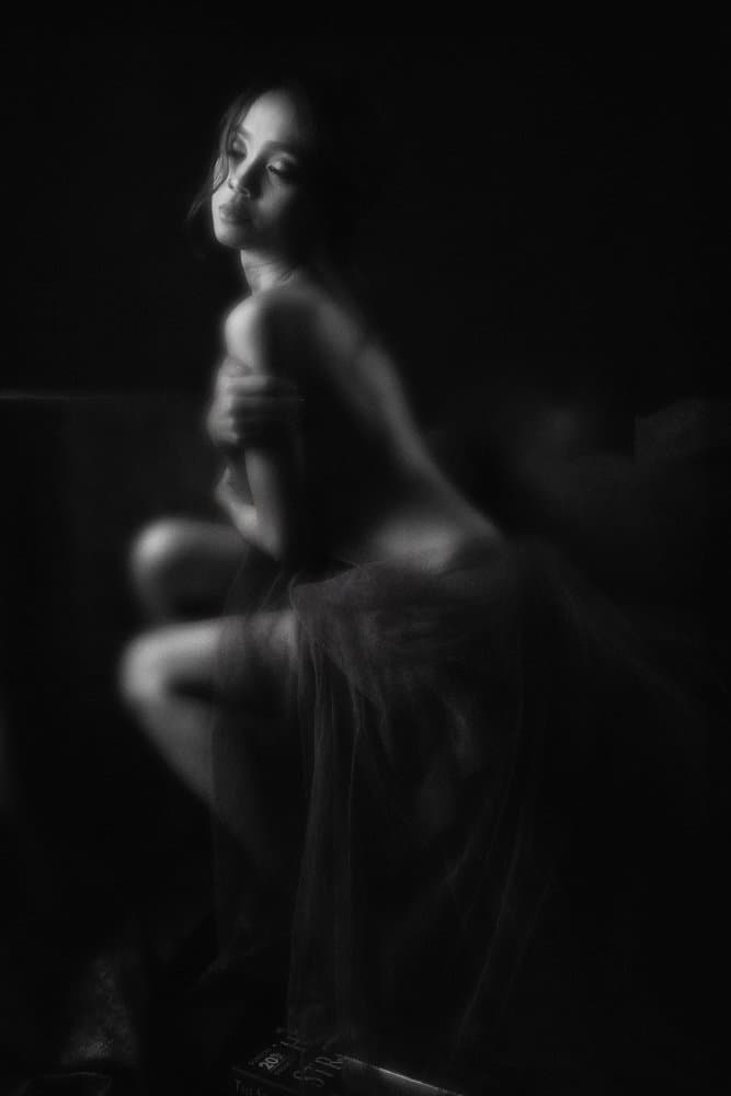 Pensive Woman In Shadows by Lita Pratikto — canvas wall art