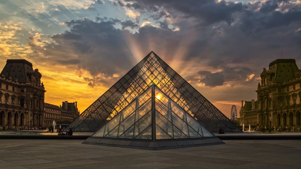 Louvre Pyramid Sunset by JUAN CARLOS HERVÁS MARTÍNEZ — canvas wall art