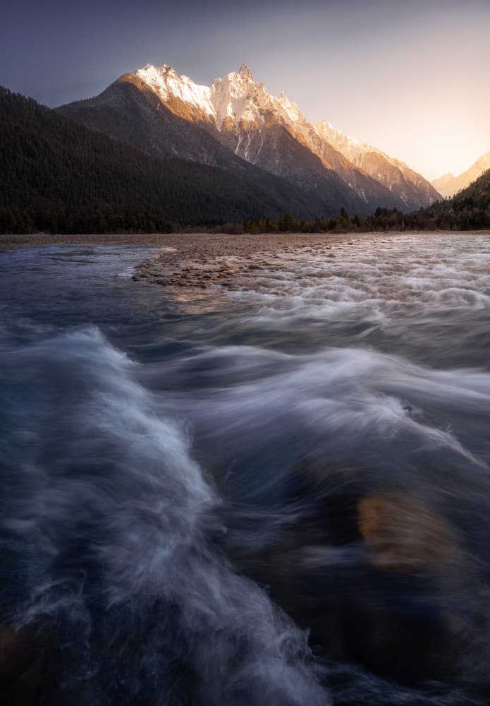 Sunlit Mountain River by Damon Hao — canvas wall art