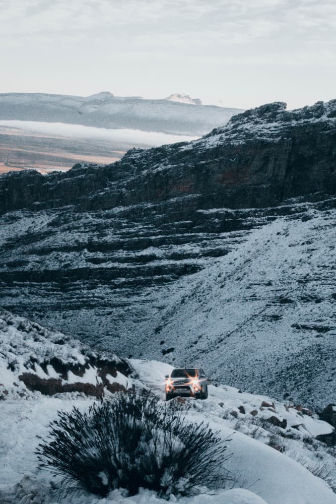Snowy Mountain SUV Adventure by Kauthar Isaacs — canvas wall art