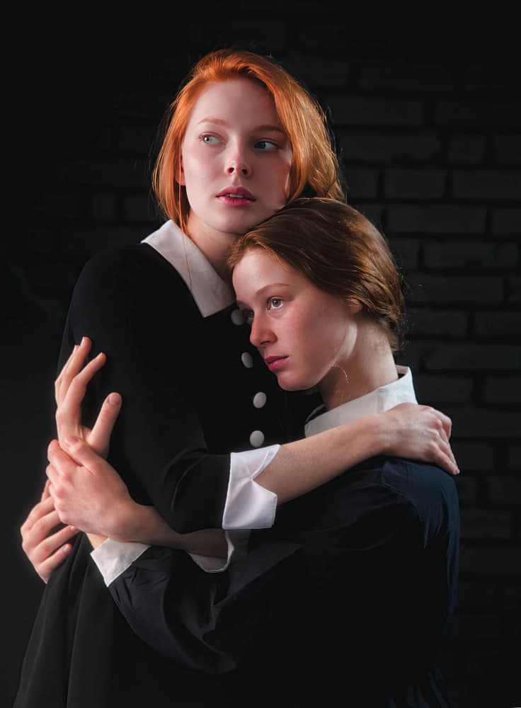Sisters' Comforting Embrace by Tali Stein — canvas wall art