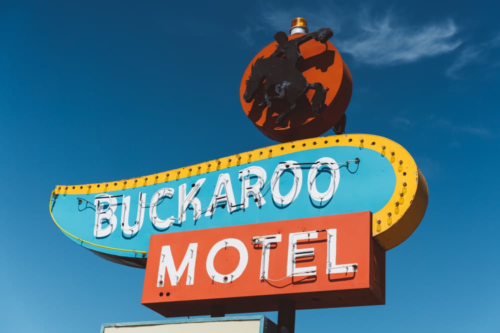 Buckaroo Motel Neon Sign by Bethany Young — canvas wall art