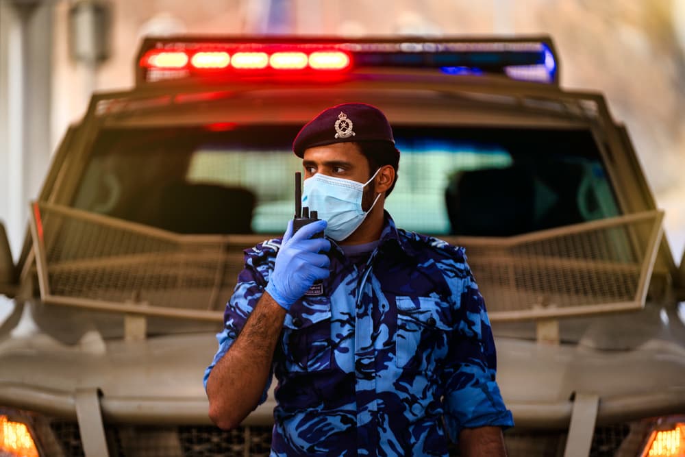 Masked Officer On Duty by Haitham AL Farsi — canvas wall art