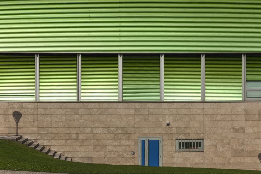Modern Green Building by Jois Domont ( J.L.G.) — canvas wall art