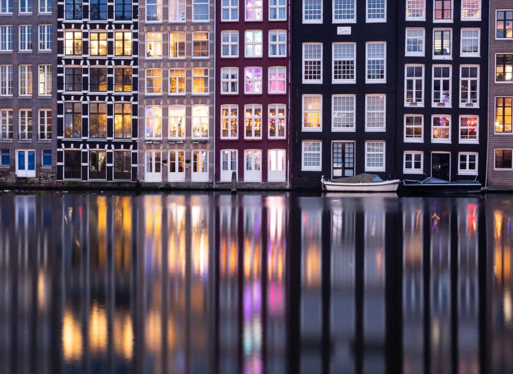 Colorful Canal Evening by Caroline Bomers — canvas wall art