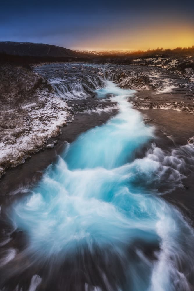 Turquoise River Glow by David Martin Castan — canvas wall art