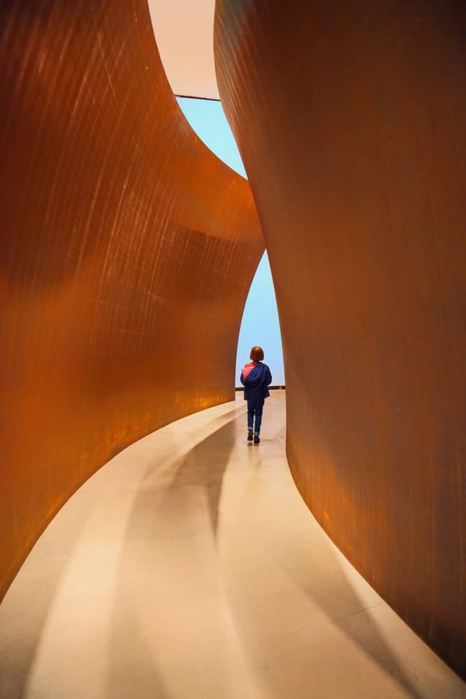 Child in Curved Corridor by Jure Kravanja — canvas wall art