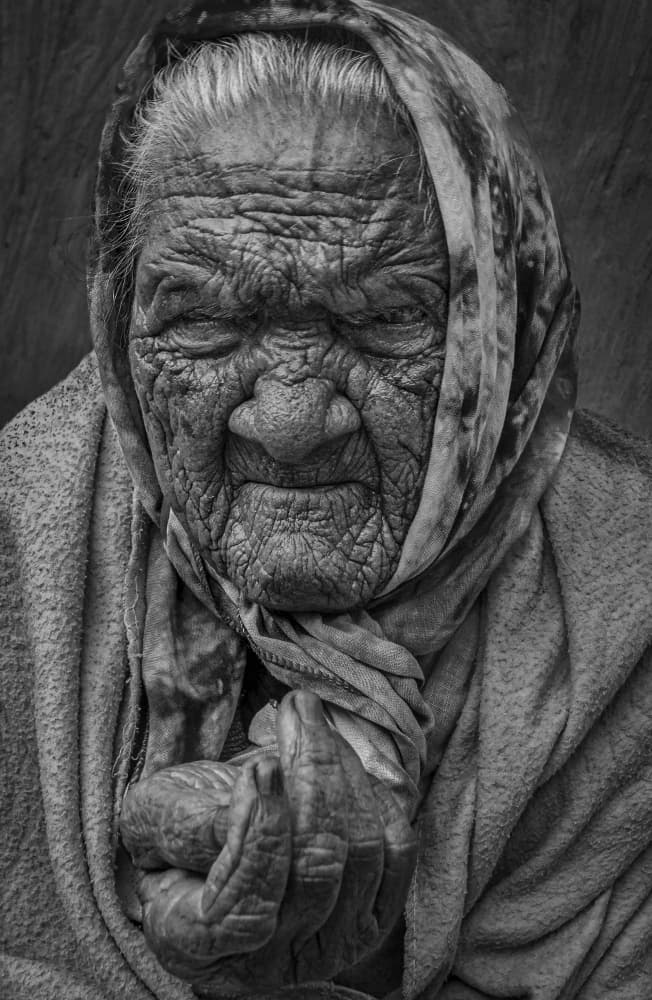 Aged Woman's Reflection by Kumar Kranti Prasad — canvas wall art