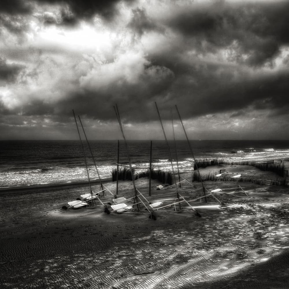 Stormy Beach Sailboats by Yvette Depaepe — canvas wall art