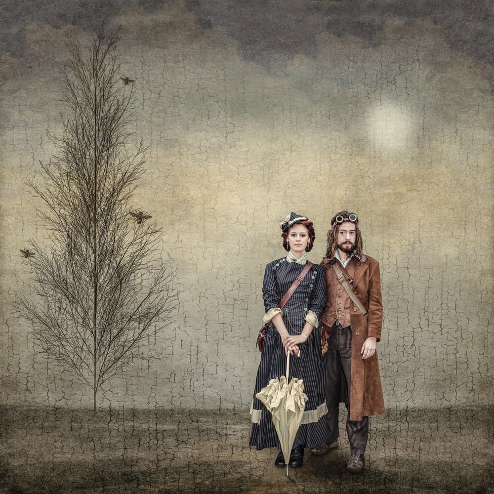 Mysterious Steampunk Couple by Joan Blease — canvas wall art