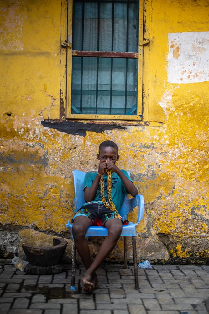 Boy by Yellow Wall by Adrian — canvas wall art