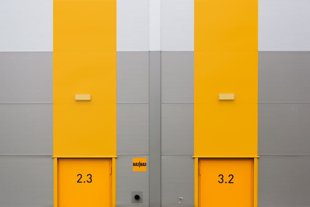 Numbered Yellow Doors by Jan Niezen — canvas wall art
