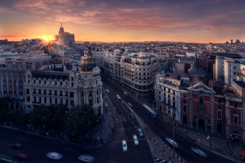 Grand City Sunset by Iván Ferrero — canvas wall art