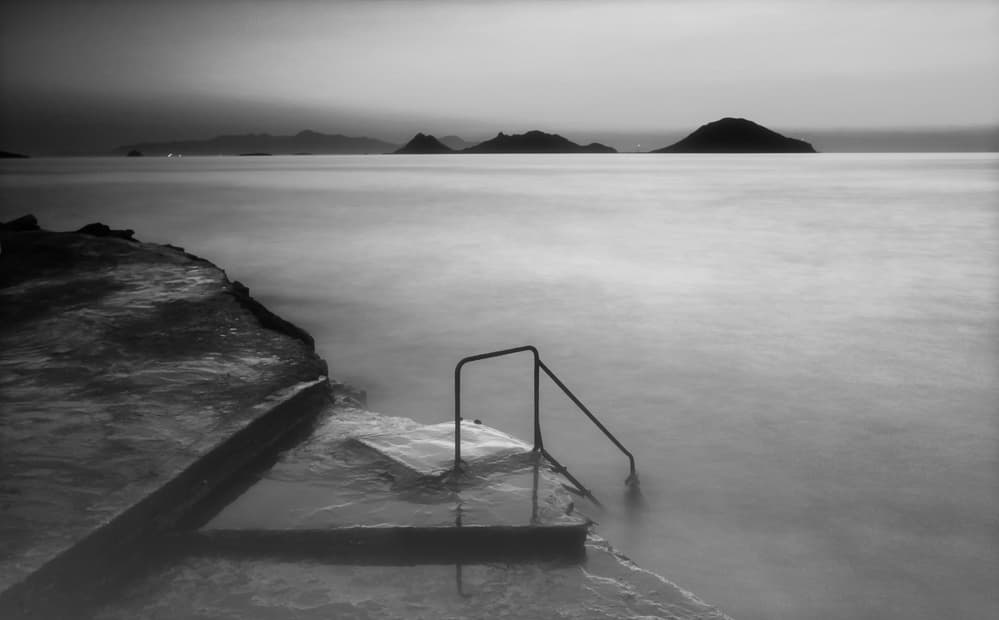 Misty Coastal Steps by Saskia Dingemans — canvas wall art