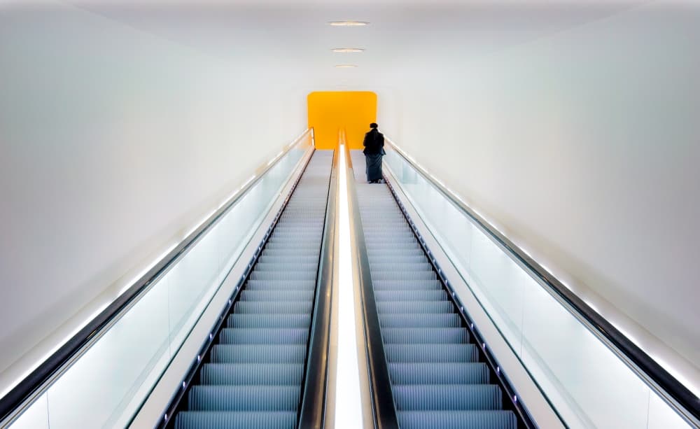 Modern Escalator Ascent by Michiel Hageman — canvas wall art