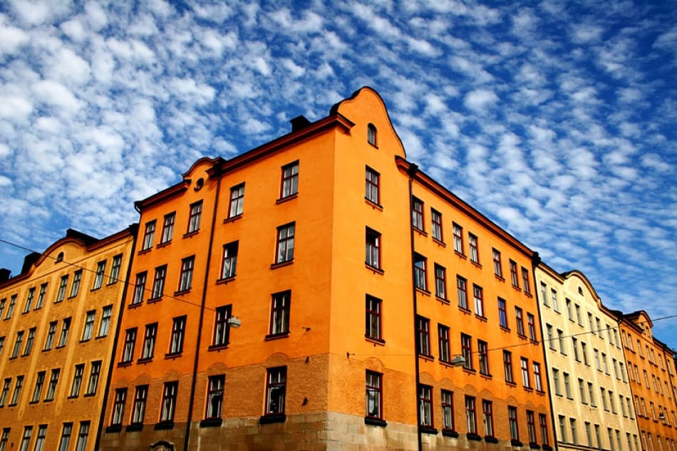Orange Buildings Blue Sky by Bror Johansson — canvas wall art
