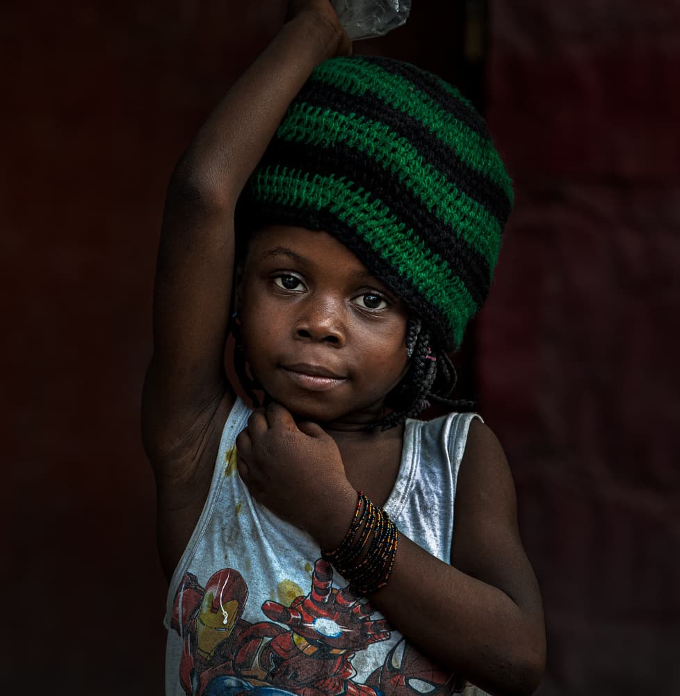 Girl in Green Beanie by Joxe Inazio Kuesta Garmendia — canvas wall art