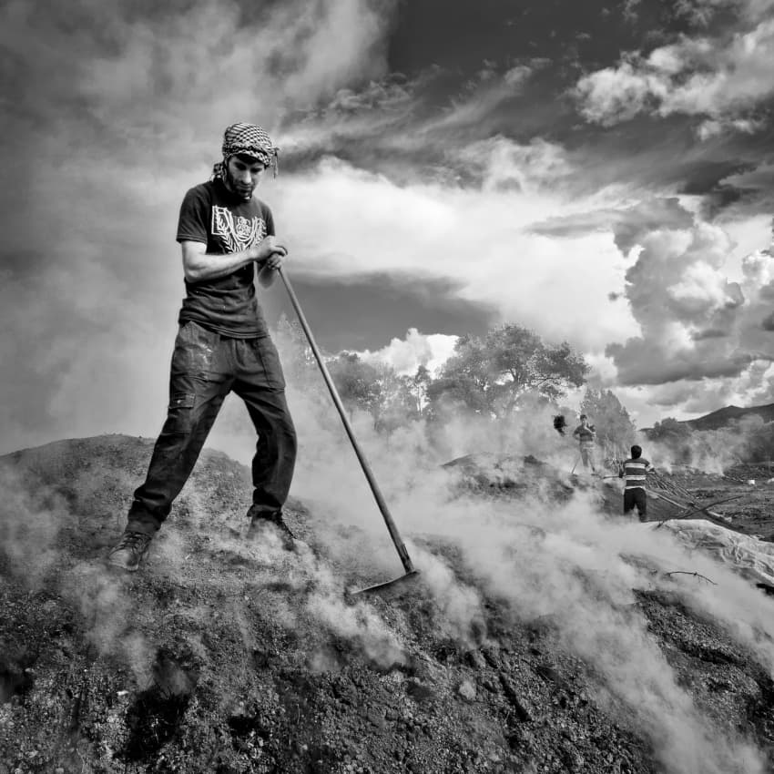 charcoal workers by Ibrahim Canakci — canvas wall art