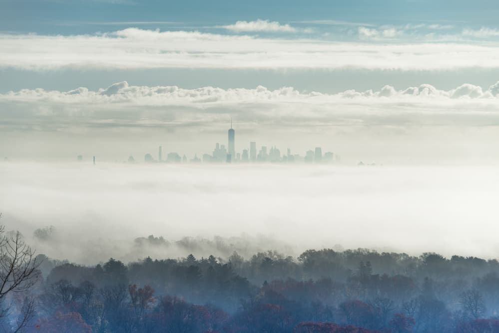 Misty City Skyline by Tony Yu — canvas wall art