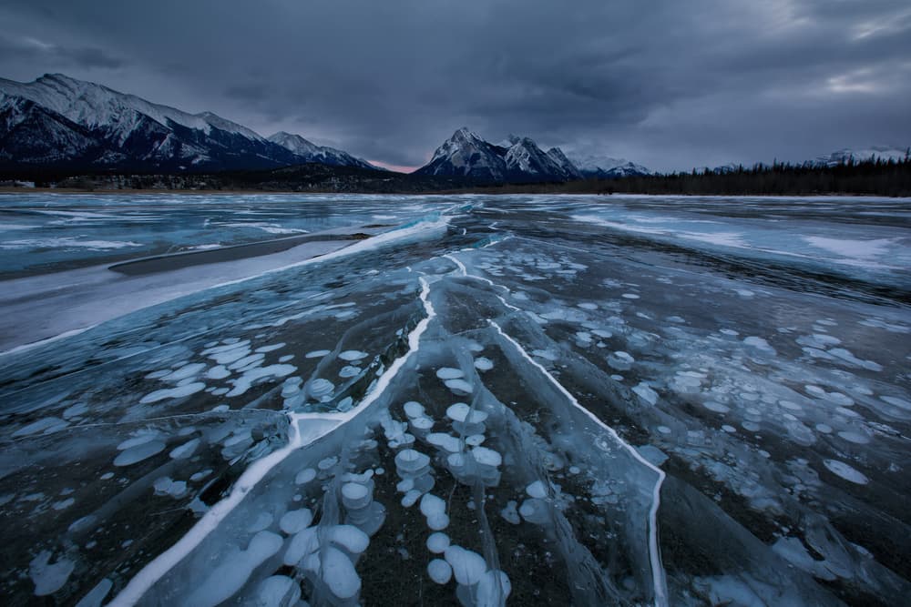 Frozen Alpine Lake Bubbles by Donald Luo — canvas wall art