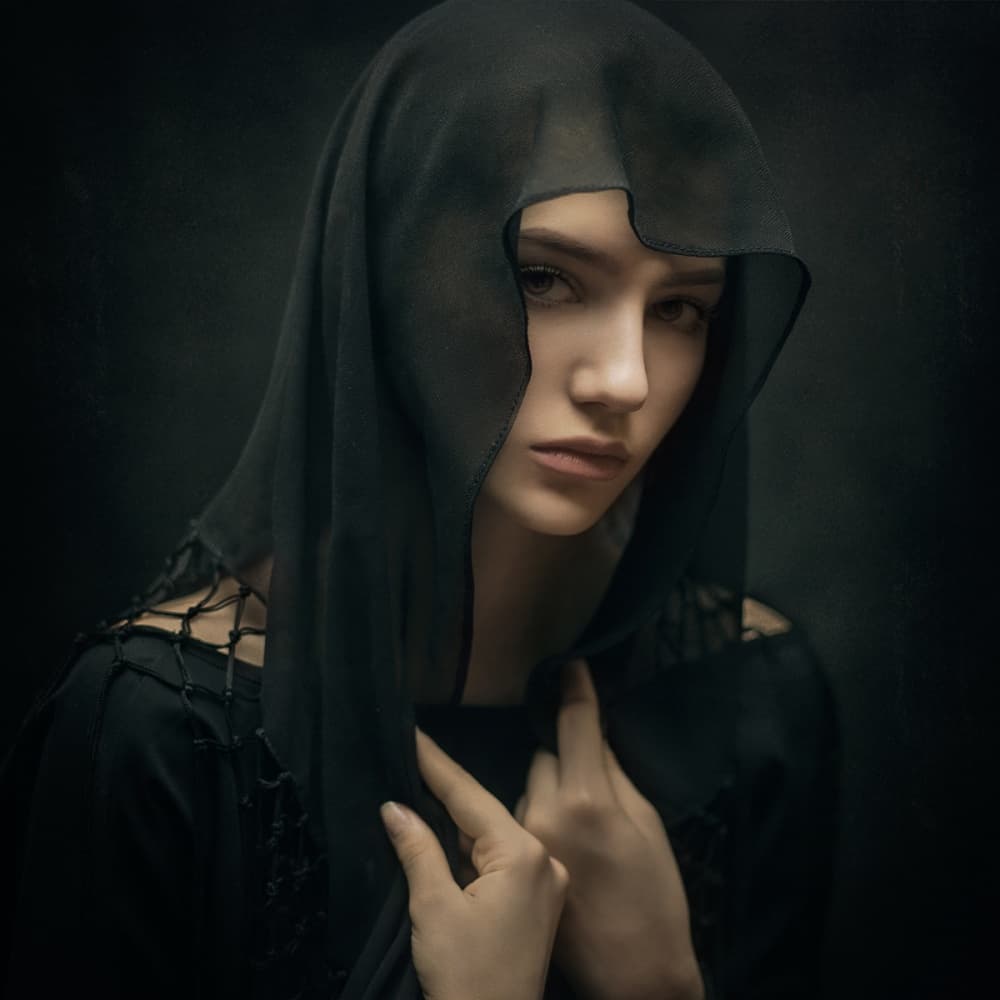 Pensive Woman in Black by Yuri Shevchenko — canvas wall art