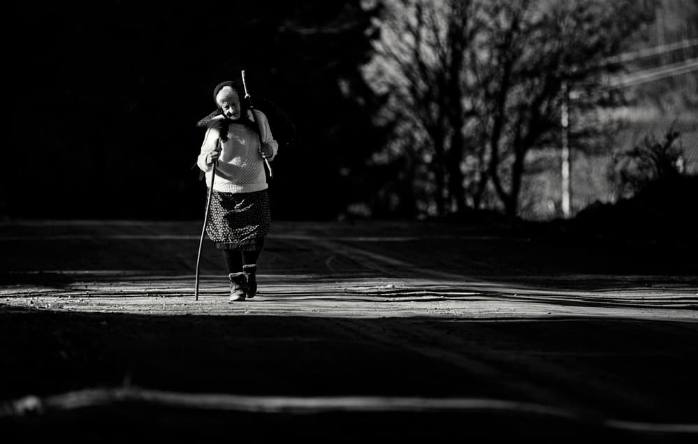 Elder Woman's Walk by Julien Oncete — canvas wall art