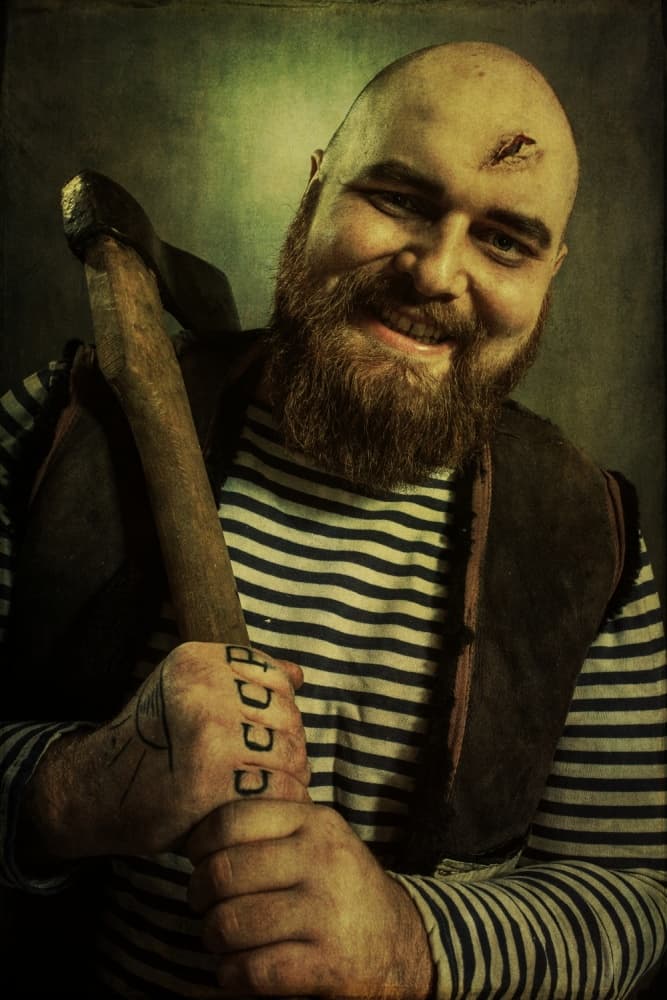 Smiling Axe Man by Photographer — canvas wall art