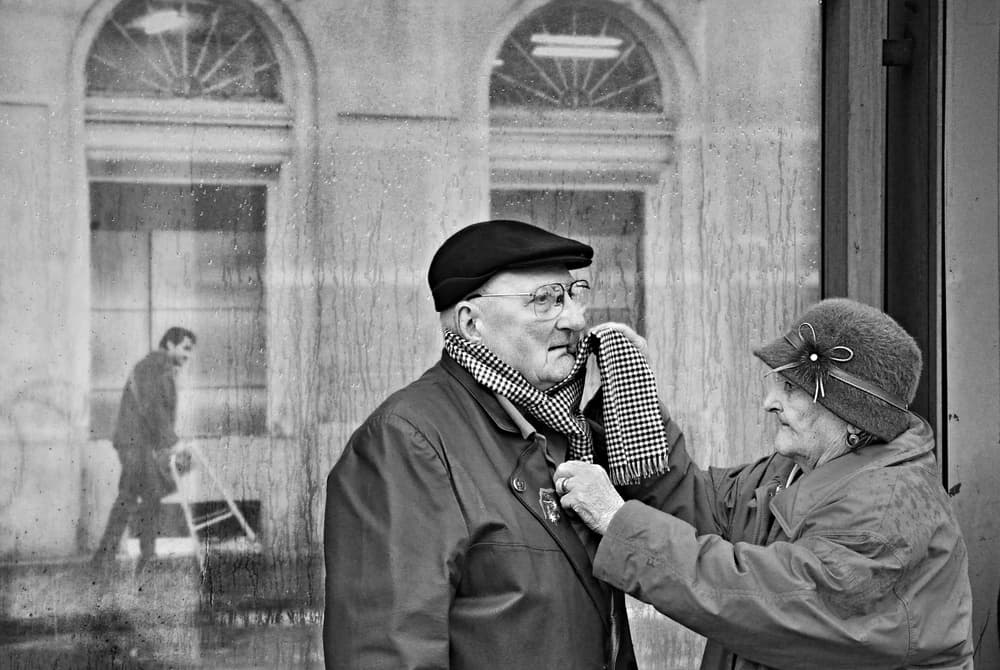 Elderly Couple's Tender Moment by Nicoleta Gabor — canvas wall art