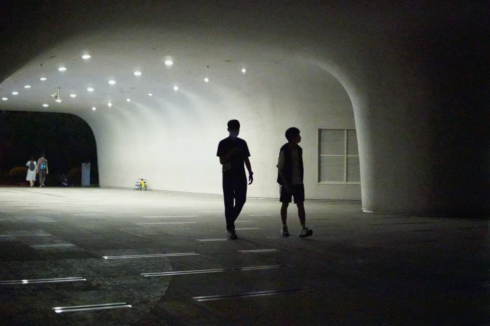 Silhouetted Figures in Modern Light by Yi-Tang Wang — canvas wall art