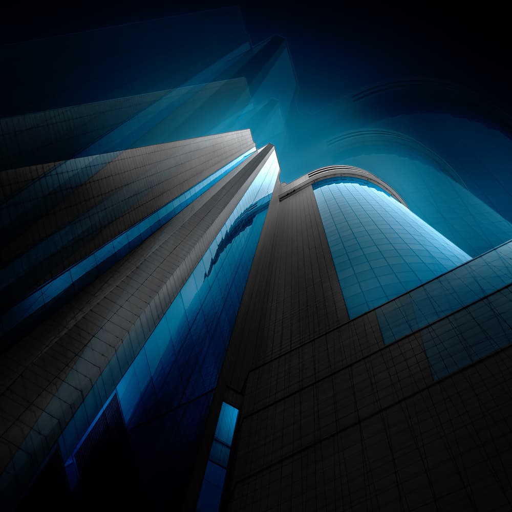 Sleek Blue Skyscrapers by Marc Huybrighs — canvas wall art