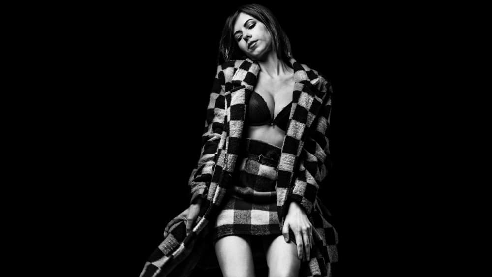 Pensive Woman in Plaid by Rosario Leonardi — canvas wall art