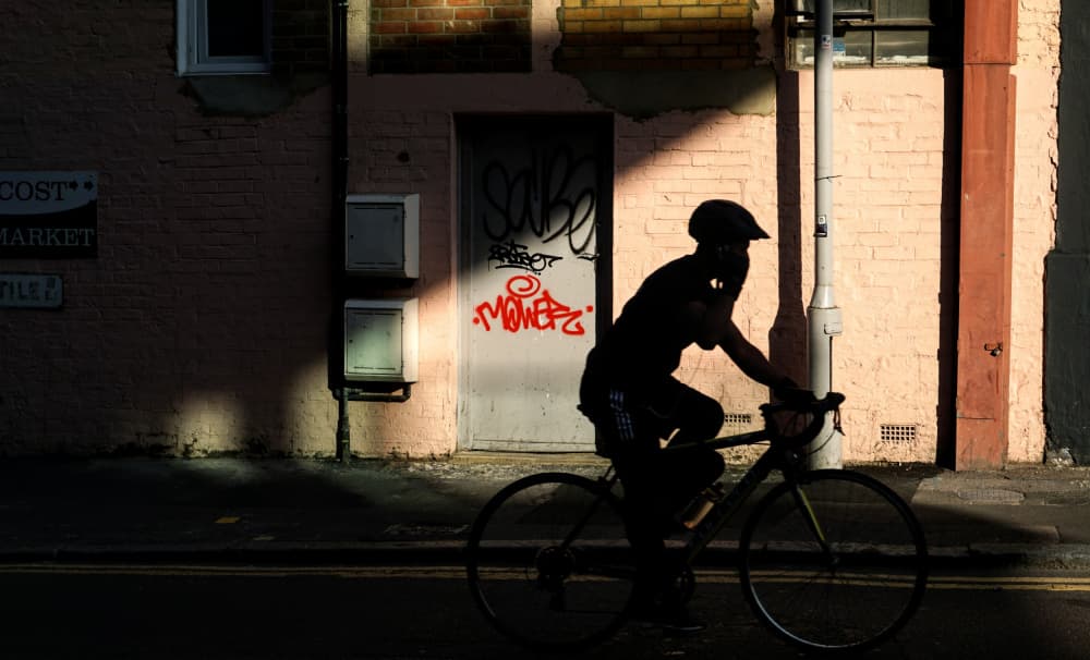 Urban Cyclist Silhouette by Markos Tsoukalas — canvas wall art