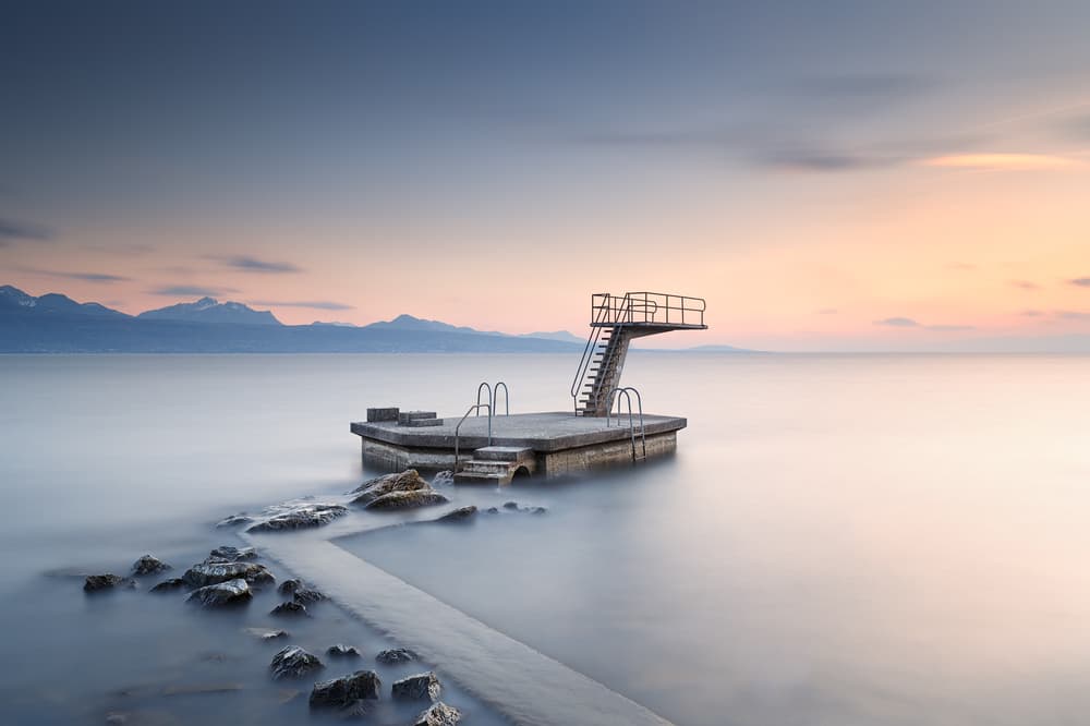 Lake Diving At Sunset by Jose Beut — canvas wall art