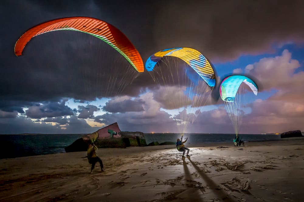 Paragliding Night Glow by Tristan Shu — canvas wall art