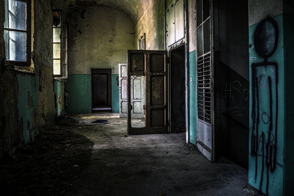 Eerie Derelict Corridor by Marco Tagliarino — canvas wall art