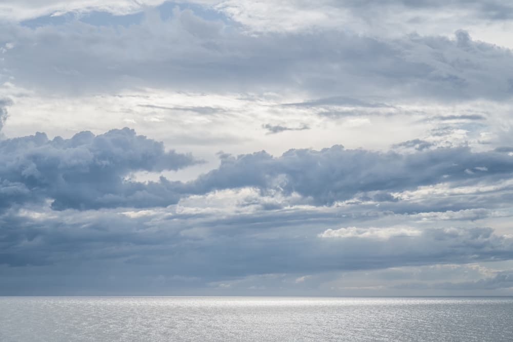 Shimmering Ocean Clouds by Photolovers — canvas wall art