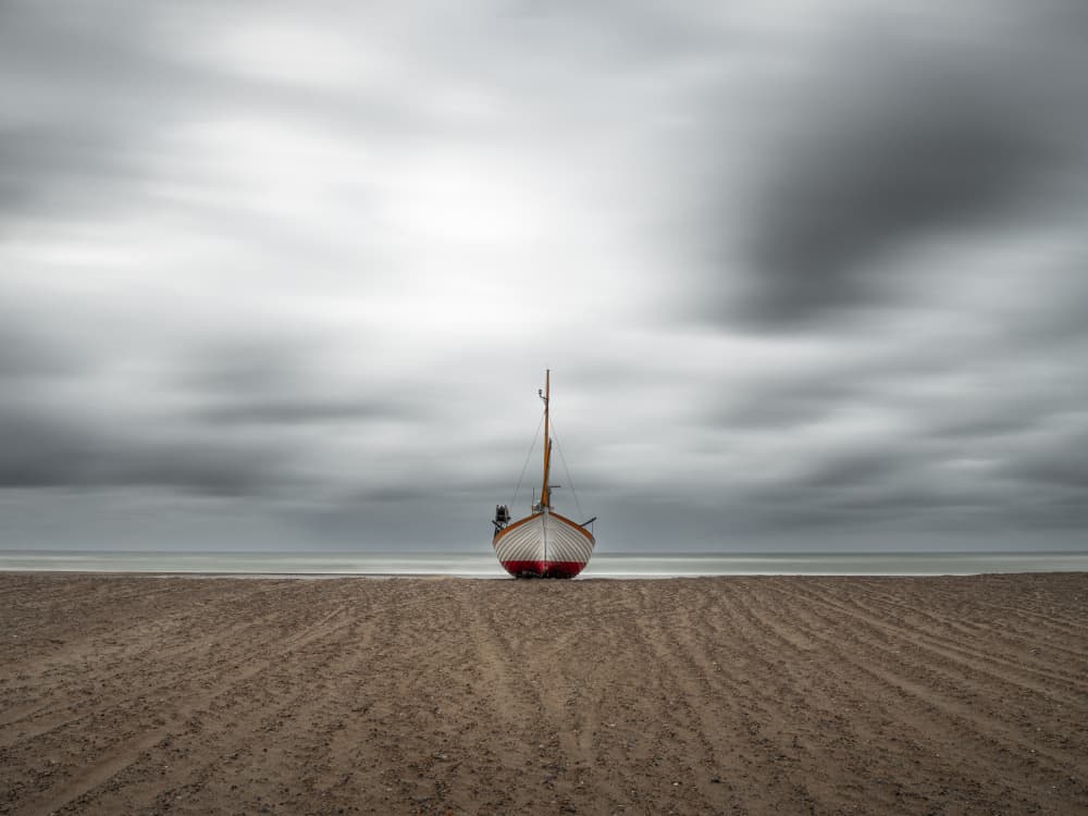 Serene Beach Boat by Andreas Christensen — canvas wall art