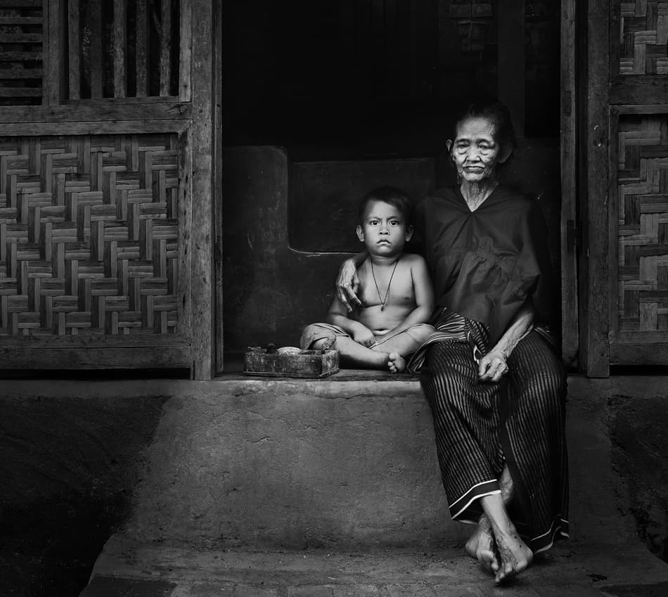 Grandmother And Grandson by Sebastian Kisworo — canvas wall art