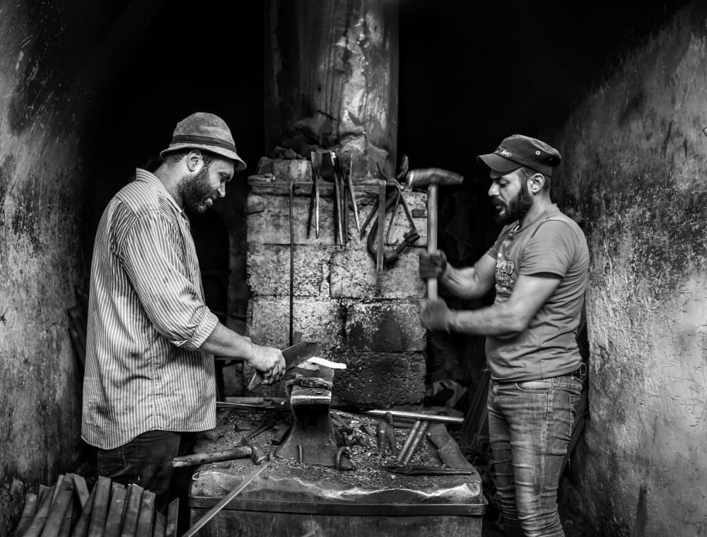 Blacksmiths At Work by Bashar Alsofey — canvas wall art