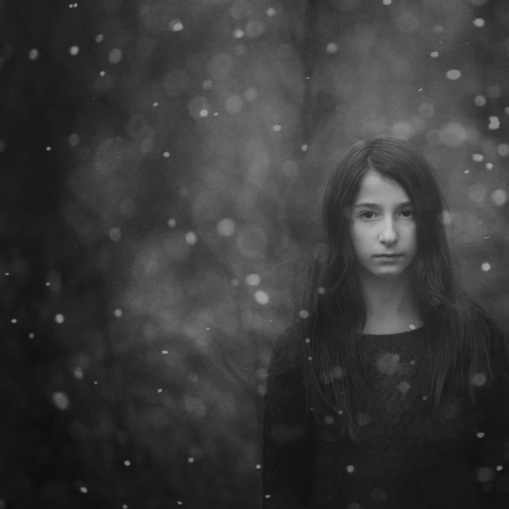 Girl In Falling Snow by Svetlana Bekyarova — canvas wall art
