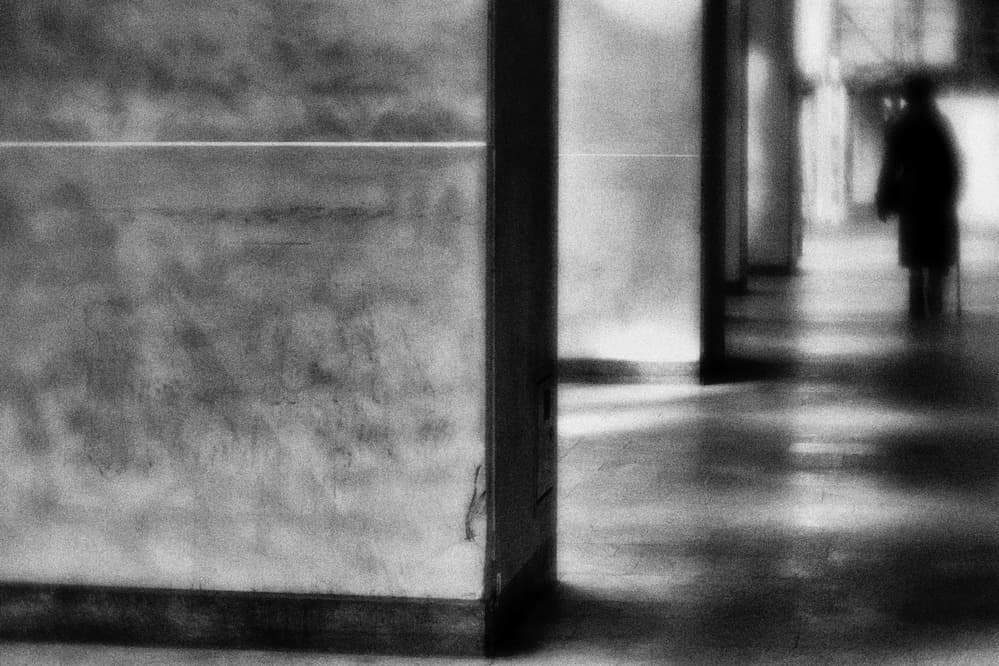 Solitary Hallway Figure by Vincenzo Pascale — canvas wall art
